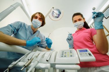 dentist-assistant-posing-with-their-tools